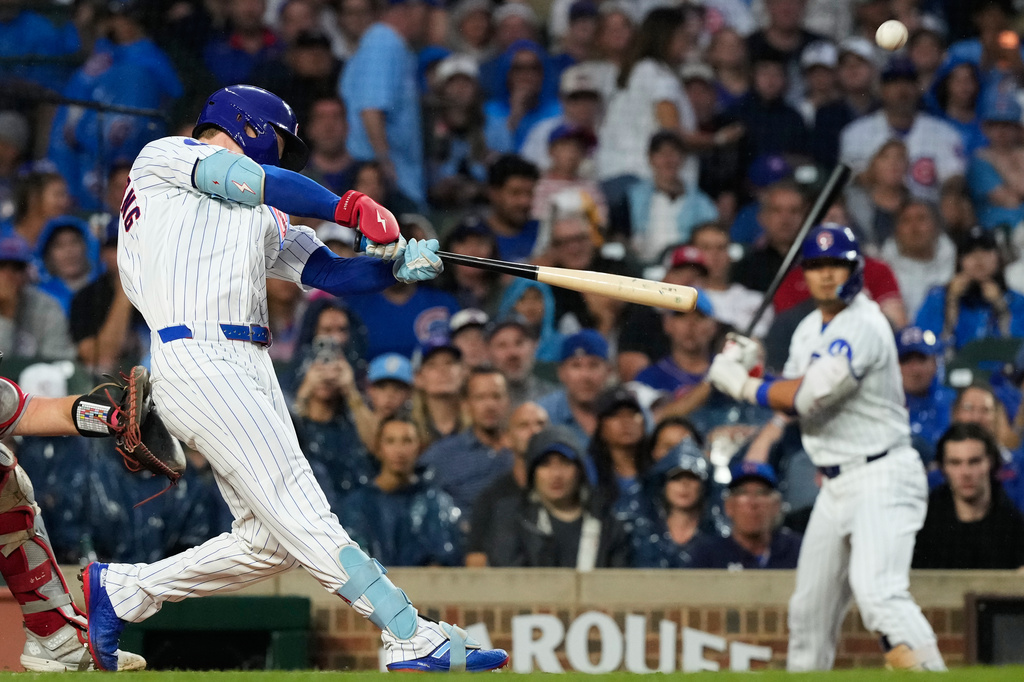 Chicago Cubs' Pete Crow-Armstrong hits a solo home run during the first inning of a baseball game against the Cincinnati Reds in Chicago, Sunday, Aug. 30, 2026. (AP Photo/Nam Y. Huh)