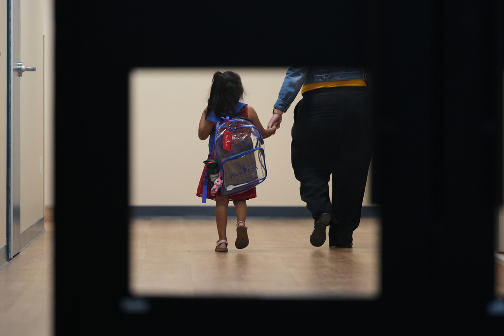 A Pre-K 4 SA student arrives for class, Oct. 9, 2025, in San Antonio. (AP Photo/Eric Gay)
