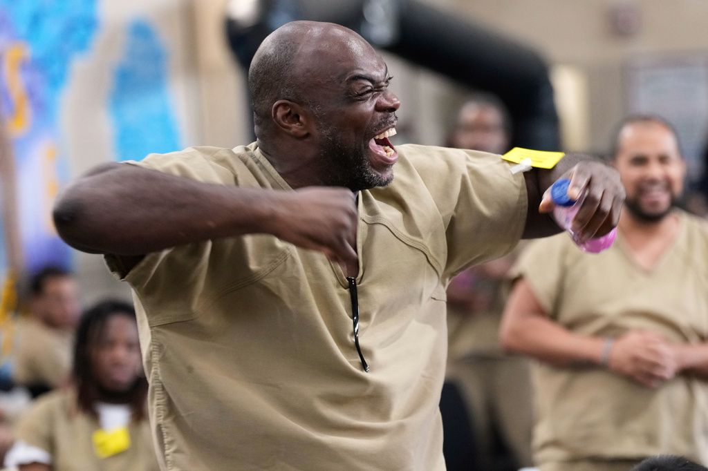 Rikers Island inmate Ralph Veal celebrates as England scores during the World Cup semifinal soccer match between England and Argentina, at the jail complex in New York, Wednesday, July 15, 2026. (AP Photo/Seth Wenig)