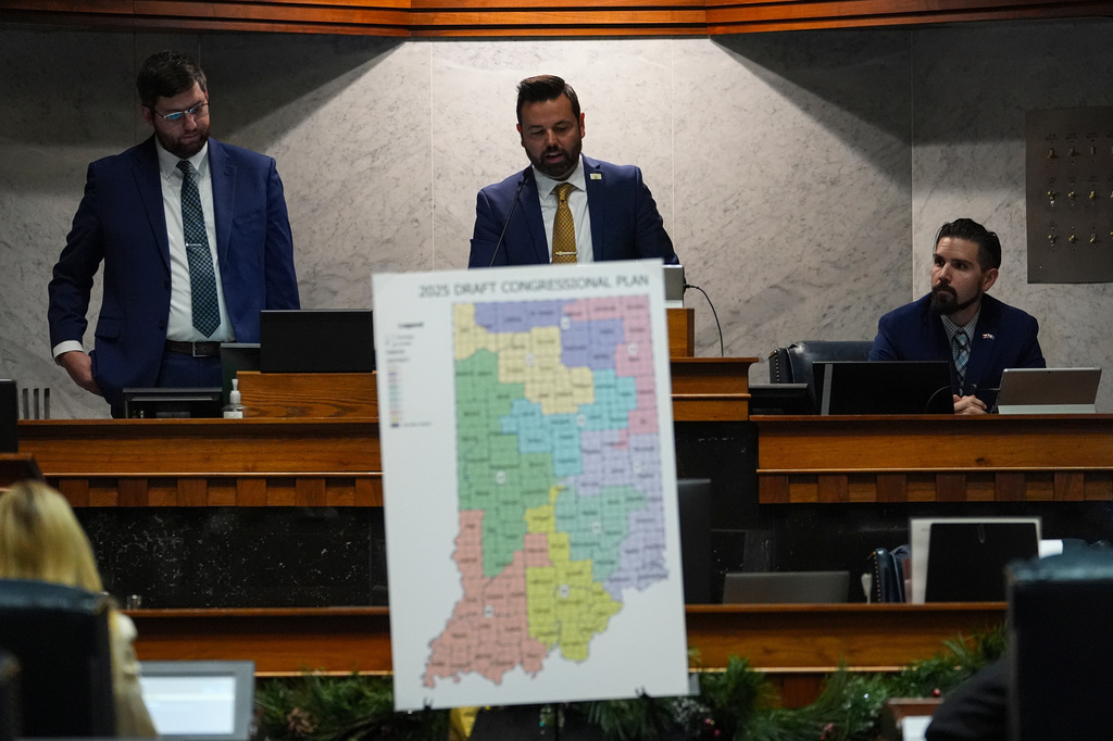 FILE - Indiana Lt. Gov. Micah Beckwith announces the results of a vote to redistrict the state's congressional map, Dec. 11, 2025, at the Statehouse in Indianapolis. (AP Photo/Michael Conroy, File)