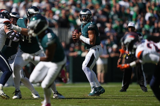 Philadelphia Eagles quarterback Jalen Hurts (1) looks to pass during the first half of an NFL football game against the Denver Broncos on Sunday, Oct. 5, 2025, in Philadelphia. (AP Photo/Matt Rourke) Philadelphia Eagles quarterback Jalen Hurts (1) looks to pass during the first half of an NFL football game against the Denver Broncos on Sunday, Oct. 5, 2025, in Philadelphia. (AP Photo/Matt Rourke)