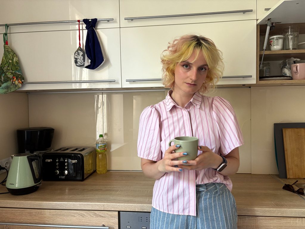 Nastya Podorozhnya stands in the kitchen of the shelter which the Martynka non-profit is running in Krakow, Poland, Thursday, July 2, 2026. (AP Photo/Claudia Ciobanu)