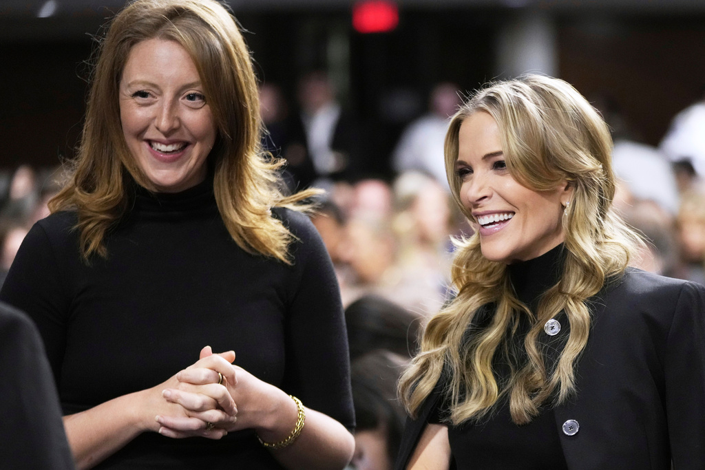 FILE - Dr. Casey Means, a wellness influencer, left, and journalist Megyn Kelly attend a confirmation hearing for Robert F. Kennedy Jr. for the Secretary of Health and Human Services post, at the Capitol in Washington, Jan. 29, 2025. (AP Photo/Ben Curtis, File)
