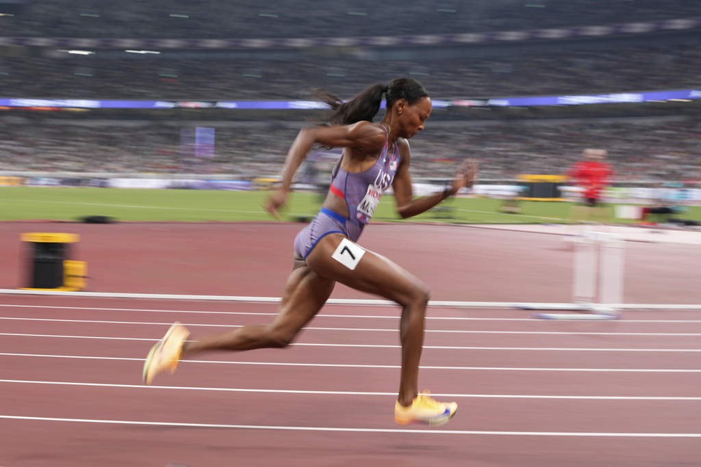United States' Dalilah Muhammad races to compete in women's 400 meters hurdles semifinal at the World Athletics Championships in Tokyo, Wednesday, Sept. 17, 2025. (AP Photo/Eugene Hoshiko)