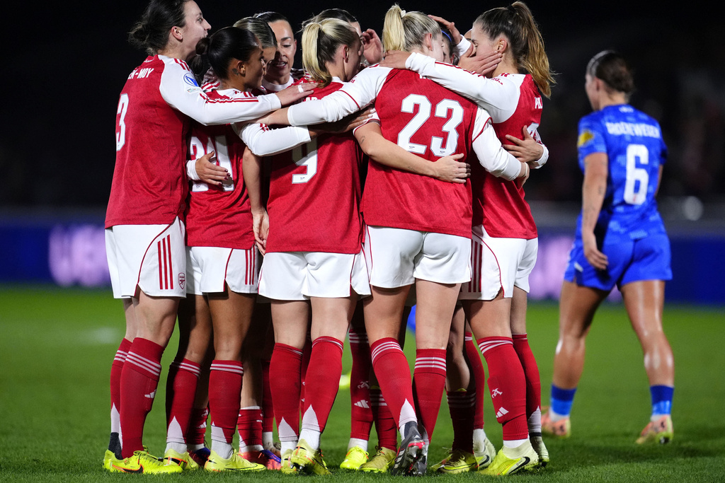 Arsenal's Beth Mead celebrates scoring with teammates during the Women's Champions League soccer match between Arsenal and FC Twente in London, Tuesday Dec. 9, 2025. (Adam Davy/PA via AP)