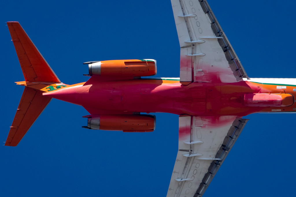 An Erickson Aero Tanker flies to refill after dropping fire retardants on a wildfire above the University of Utah in Salt Lake City on Sunday, June 21, 2026. (Rio Giancarlo/The Deseret News via AP)