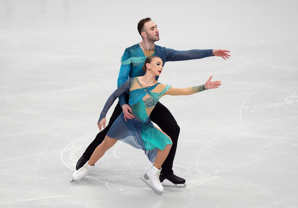 Georgia's Anastasiia Metelkina and Luka Berulava compete during the Pairs Free Skating on day two of the ISU European Figure Skating Championships in Sheffield, England, Thursday, Jan. 15, 2026. (Mike Egerton/PA via AP)