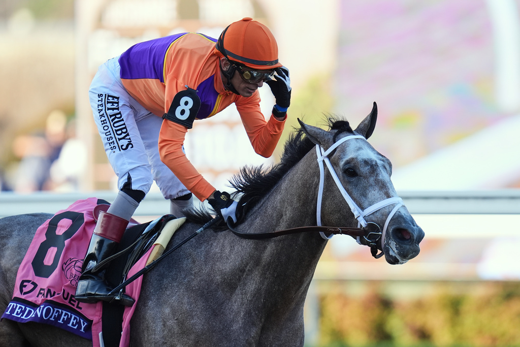 FILE - John Velazquez reacts after riding Ted Noffey to victory in the Breeders' Cup Juvenile horse race in Del Mar, Calif., Oct. 31, 2025. (AP Photo/Gregory Bull, File)
