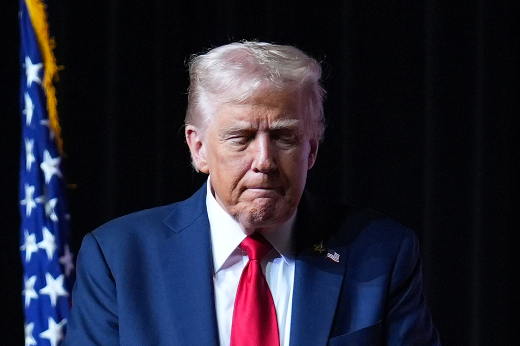 President Donald Trump walking off stage after speaking to a gathering of top U.S. military commanders at Marine Corps Base Quantico, Tuesday, Sept. 30, 2025, in Quantico, Va. (AP Photo/Evan Vucci)