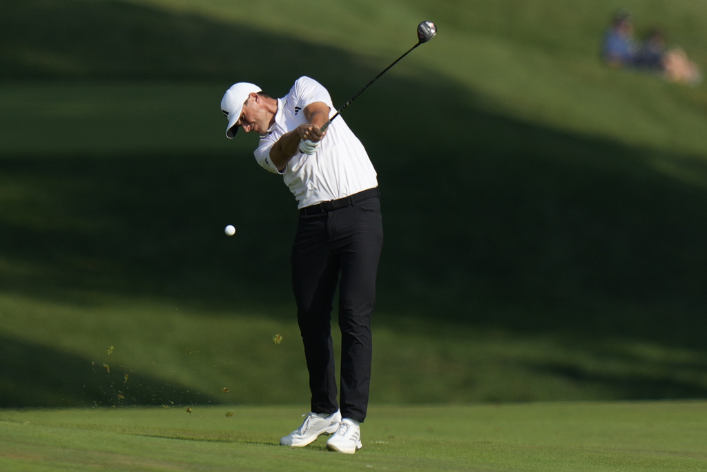 Ludvig Åberg, of Sweden, hits on the 16th hole during the third round of the BMW Championship golf tournament Saturday, Aug. 16, 2025, in Owings Mills, Md. (AP Photo/Stephanie Scarbrough)
