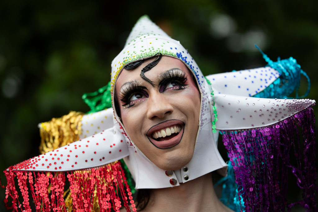 Mirana, a drag artist, smiles during the annual Rio Pride parade along Copacabana Beach in Rio de Janeiro, Sunday, Nov. 23, 2025. (AP Photo/Bruna Prado)