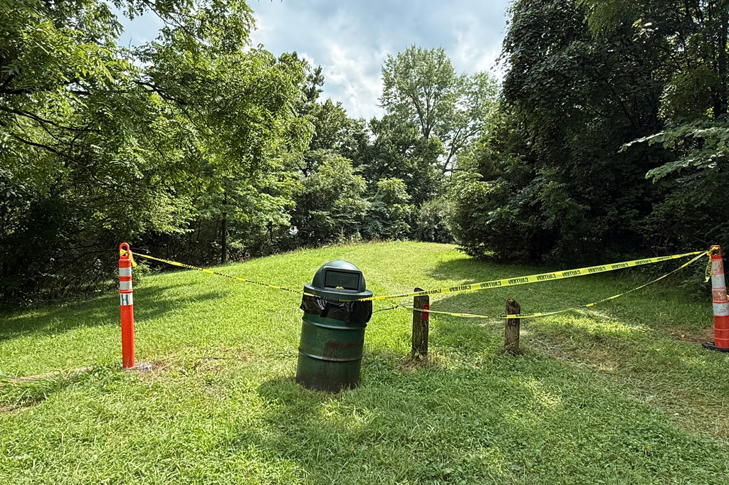 A section of the Riverside Dr Scioto Fishing Area is sectioned off on Tuesday, July 21, 2026, in Powell, Ohio. (AP Photo/Patrick Aftoora-Orsagos)