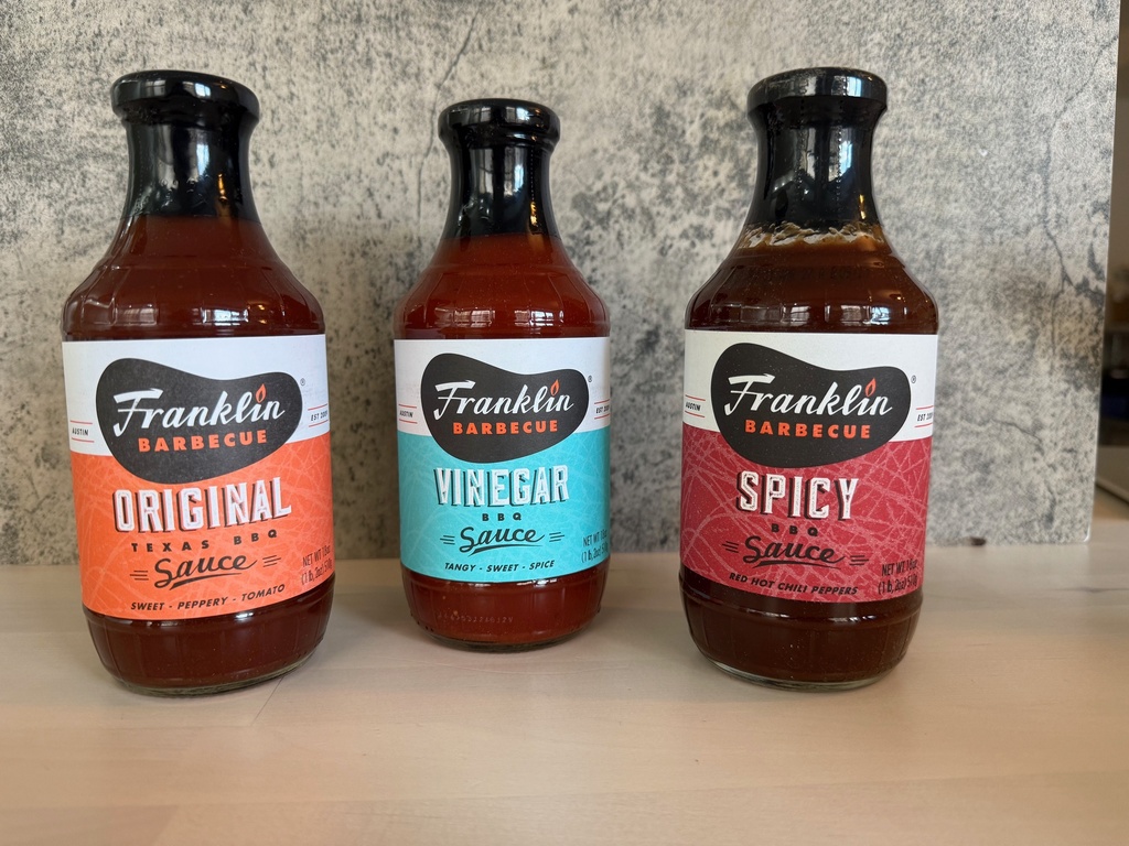 Bottles of Franklin BBQ sauces from Austin, Texas, are displayed in New York. (Katie Workman via AP)