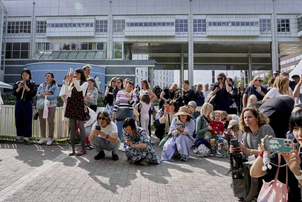Finland Moomins Fans celebrate the 80th anniversary of the publication of the Finnish children's classic, "The Moomins and The Great Flood," and the birthday of the author Tove Jansson, in Tampere, Finland, Saturday, Aug. 9, 2025. (AP Photo/Tommi Ojala)