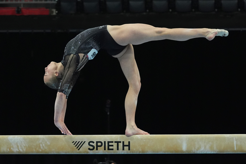 Claire Pease competes in the women's balance beam during the U.S. Gymnastics Championships, Sunday, Aug. 9, 2026, in Phoenix. (AP Photo/Ross D. Franklin)