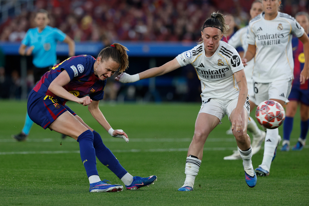 Barcelona's Graham Hansen scores her side's fifth goal during a Champions League quarterfinal soccer match between Barcelona and Real Madrid, in Barcelona, Spain, Thursday, April 2 2026. (AP Photo/Joan Monfort)