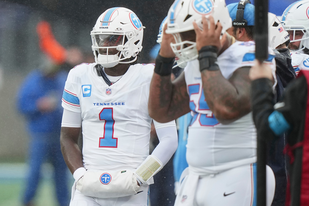 Tennessee Titans quarterback Cam Ward (1) looks onto the field during the first half of an NFL football game against the New York Giants in East Rutherford, N.J., Sunday, Sept. 27, 2026. (AP Photo/Frank Franklin II)