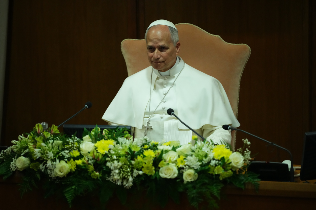 Pope Leo XIV attends the presentation of his first encyclical, "Magnifica humanitas: On Safeguarding the Human Person in the Time of Artificial Intelligence," at the Vatican, Monday, May 25, 2026. (AP Photo/Alessandra Tarantino)
