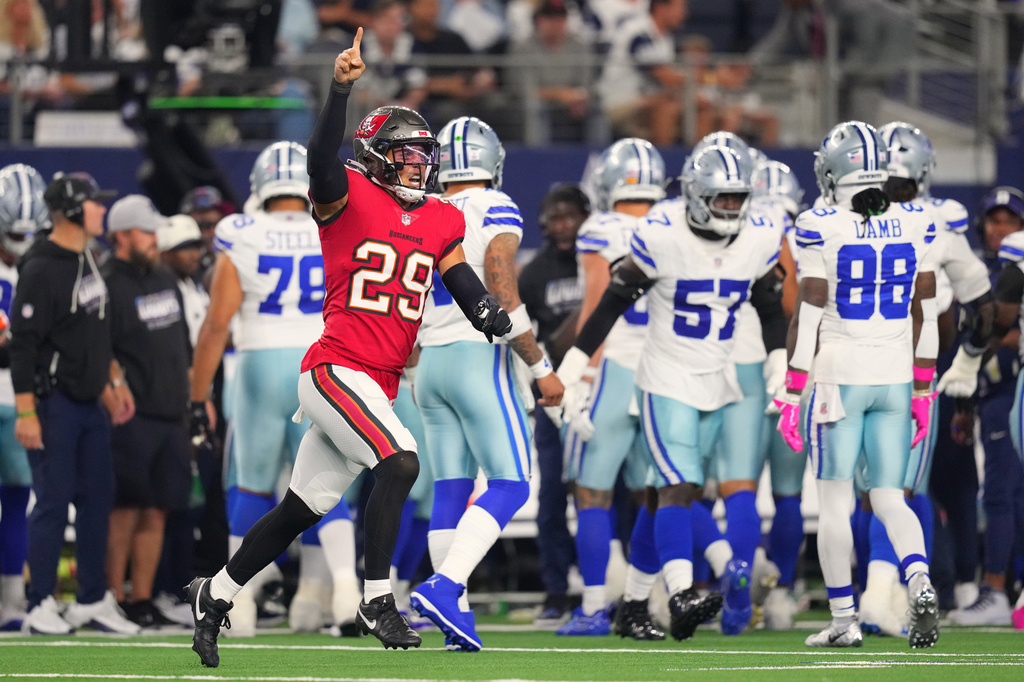 Tampa Bay Buccaneers safety Miles Killebrew (29) celebrates after the Buccaneers recovered a fumbled kickoff return by the Dallas Cowboys in the second half of an NFL football game in Arlington, Texas on Thursday, Oct. 8, 2026. (AP Photo/Julio Cortez)