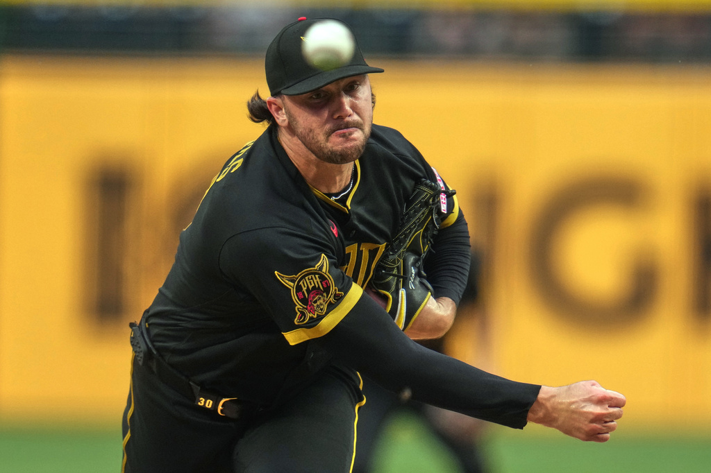 Pittsburgh Pirates pitcher Paul Skenes delivers during the first inning of a baseball game against the Cincinnati Reds in Pittsburgh, Friday, June 26, 2026. (AP Photo/Gene J. Puskar)