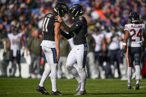 Baltimore Ravens place kicker Tyler Loop (33), right, celebrates his field goal with punter Jordan Stout (11) during the second half an NFL football game against the Chicago Bears, Sunday, Oct. 26, 2025, in Baltimore. (AP Photo/Nick Wass) Baltimore Ravens place kicker Tyler Loop (33), right, celebrates his field goal with punter Jordan Stout (11) during the second half an NFL football game against the Chicago Bears, Sunday, Oct. 26, 2025, in Baltimore. (AP Photo/Nick Wass)