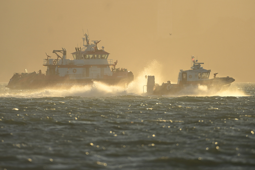 Search and rescue vessels look for missing victims after a boat accident near Alcatraz Island off San Francisco, Tuesday, July 14, 2026. (AP Photo/Noah Berger)