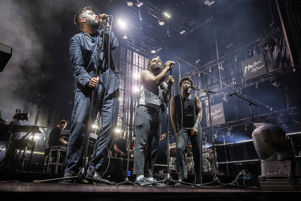 FILE - British Trip Hop collective Massive Attack performs on the Lake stage during the 58th Montreux Jazz Festival (MJF), in Montreux, Switzerland, July 15, 2024. (Valentin Flauraud/Keystone via AP, File)