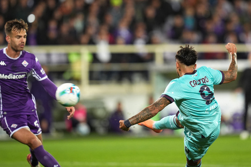 Bologna's Santiago Castro, right, scores his side's opening goal, during the Italian Serie A soccer match between Fiorentina and Bologna, in Florence, Italy, Sunday, Oct. 26, 2025. (Massimo Paolone/LaPresse via AP) Bologna's Santiago Castro, right, scores his side's opening goal, during the Italian Serie A soccer match between Fiorentina and Bologna, in Florence, Italy, Sunday, Oct. 26, 2025. (Massimo Paolone/LaPresse via AP)