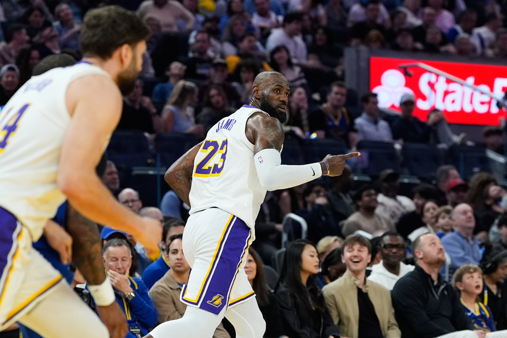 Los Angeles Lakers forward LeBron James (23) reacts after making a 3-point basket during the first half of an NBA basketball game against the Golden State Warriors, Saturday, Feb. 28, 2026, in San Francisco. (AP Photo/Godofredo A. Vásquez)