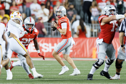 Ohio State quarterback Julian Sayin looks for an open receiver against Minnesota during the first half of an NCAA college football game, Saturday, Oct. 4, 2025, in Columbus, Ohio. (AP Photo/Jay LaPrete) Ohio State quarterback Julian Sayin looks for an open receiver against Minnesota during the first half of an NCAA college football game, Saturday, Oct. 4, 2025, in Columbus, Ohio. (AP Photo/Jay LaPrete)
