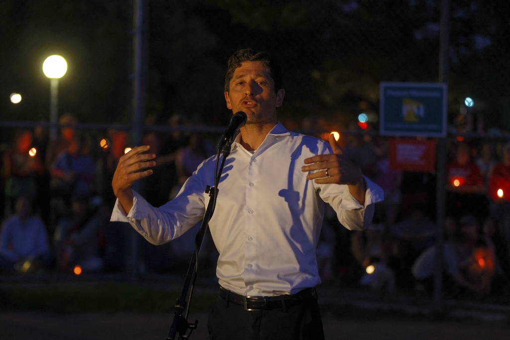 Minneapolis Mayor Jacob Frey speaks as people gather at a vigil at Lynnhurst Park after a shooting at the Annunciation Catholic School Wednesday, Aug. 27, 2025, in Minneapolis. (AP Photo/Bruce Kluckhohn)
