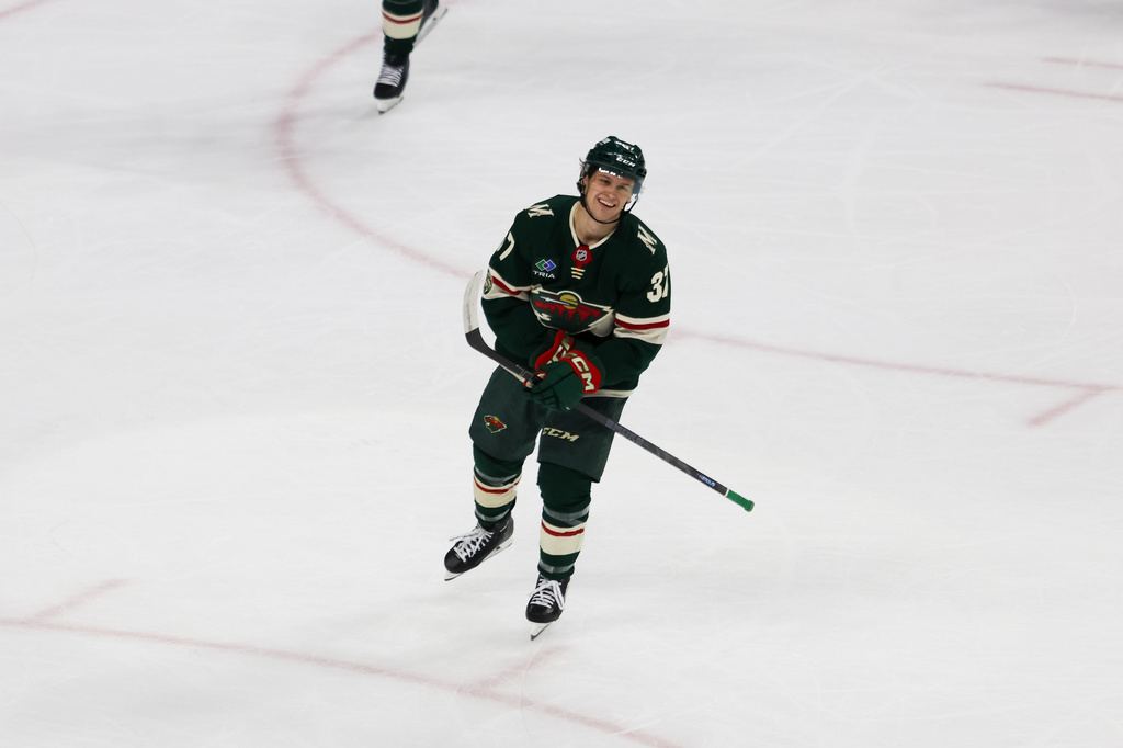 Minnesota Wild's Hunter Haight smiles after scoring his first NHL goal against the Anaheim Ducks during the second period of an NHL hockey game Tuesday, April 14, 2026, in St. Paul, Minn. (AP Photo/Lily Dozier)