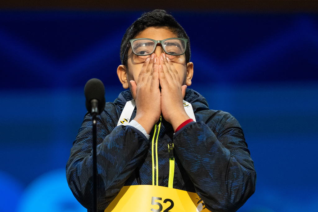Anay Mahesh, 13, of Orlando, Fla., reacts after answering incorrectly during the quarterfinals of the Scripps National Spelling Bee, Wednesday, May 27, 2026, in Washington. (AP Photo/Allison Robbert)