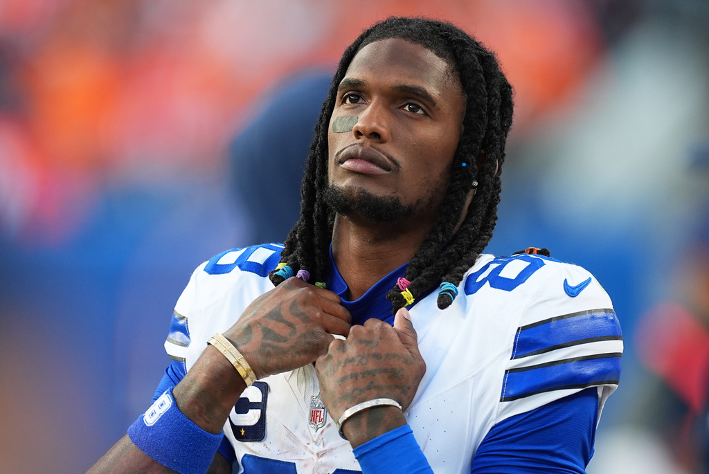 Dallas Cowboys wide receiver CeeDee Lamb heads off the field as time runs out in an NFL football game against the Denver Broncos, Sunday, Oct. 26, 2025, in Denver. (AP Photo/David Zalubowski)