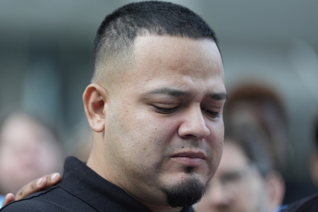 Kilmar Abrego Garcia attends a protest rally at the Immigration and Customs Enforcement field office in Baltimore, Monday, Aug. 25, 2025, to support Abrego Garcia. (AP Photo/Stephanie Scarbrough)