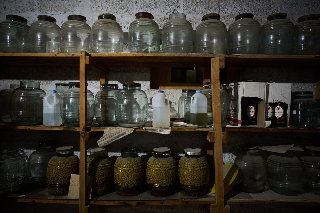 Jars of preserved olives, made in past years from the harvest are stored at the Benedictine monastery's garden on the Mount of Olives, in Jerusalem, Friday, Oct. 17, 2025. (AP Photo/Oded Balilty) Jars of preserved olives, made in past years from the harvest are stored at the Benedictine monastery's garden on the Mount of Olives, in Jerusalem, Friday, Oct. 17, 2025. (AP Photo/Oded Balilty)