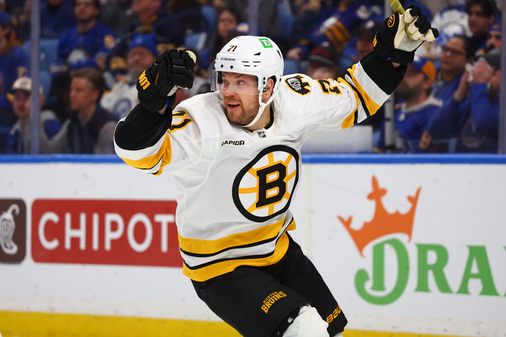 Boston Bruins left wing Viktor Arvidsson (71) celebrates his goal during the second period in Game 2 of a first-round NHL hockey Stanley Cup playoff series against the Buffalo Sabres Tuesday, April 21, 2026, in Buffalo, N.Y. (AP Photo/Jeffrey T. Barnes)