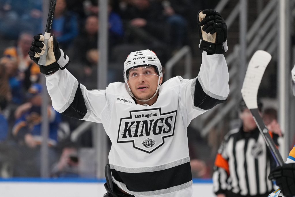 Los Angeles Kings' Trevor Moore (12) celebrates after scoring during the third period of an NHL hockey game against the St. Louis Blues Saturday, Jan. 24, 2026, in St. Louis. (AP Photo/Jeff Roberson)