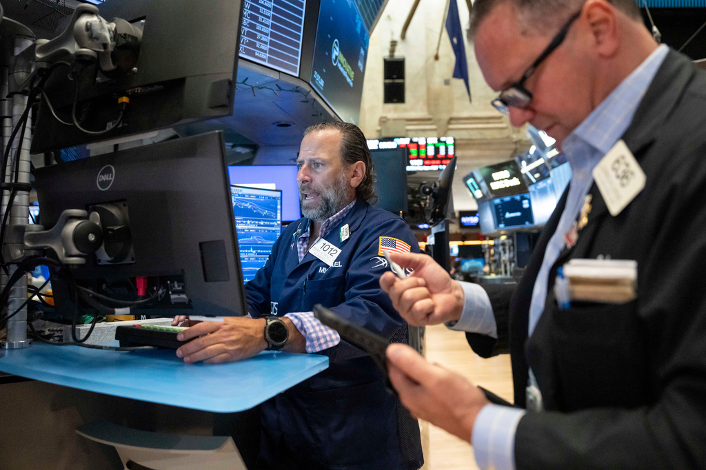 Specialist Michael Pistillo works on the floor of the New York Stock Exchange, Thursday, Aug. 27, 2026, in New York. (AP Photo/Yuki Iwamura)