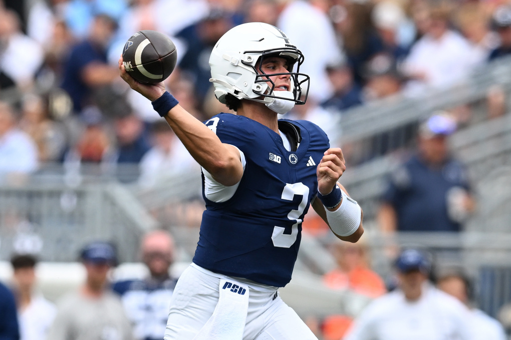 Penn State quarterback Rocco Becht throws the ball against Buffalo during the first quarter of an NCAA college football game, Saturday, Sept. 19, 2026, in State College, Pa. (AP Photo/Barry Reeger)