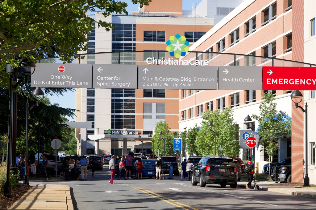 The main entrance to Wilmington Hospital is shown in the aftermath of a shooting on Tuesday, June 16, 2026, in Wilmington, Del. (AP Photo/Mingson Lau)