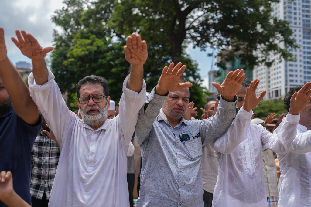 Indian Muslims offer "Namaz-e-Istasqa" a special prayer for rains in Mumbai, India, Sunday, June 21, 2026. (AP Photo/Rafiq Maqbool)