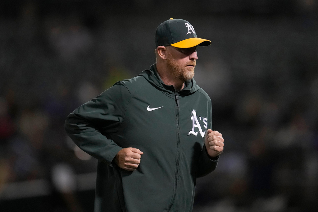 FILE - Oakland Athletics pitching coach Scott Emerson jogs during a baseball game against the Toronto Blue Jays in Oakland, Calif., Sept. 5, 2023. (AP Photo/Jeff Chiu, File)