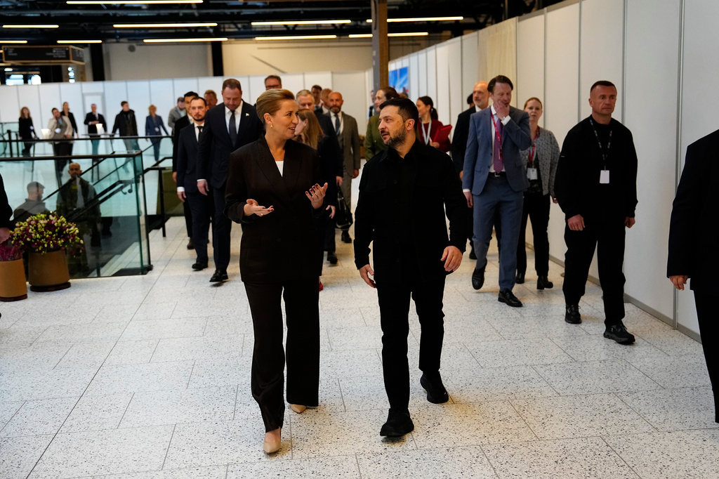 Denmark's Prime Minister Mette Frederiksen, front left, and Ukraine's President Volodymyr Zelenskyy, front right, talk prior to an meeting of the European Political Community in Copenhagen, Denmark, Thursday, Oct. 2, 2025. (Mads Claus Rasmussen/Ritzau Scanpix via AP)