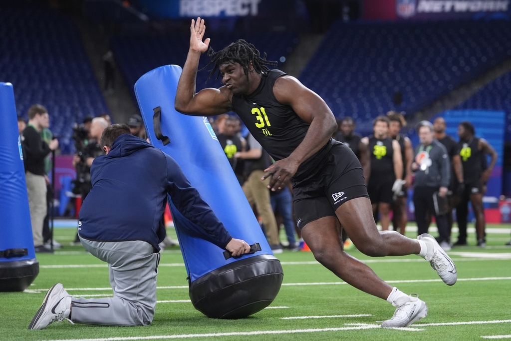 Texas Tech defensive lineman David Bailey (31) runs a drill at the NFL football scouting combine in Indianapolis, Thursday, Feb. 26, 2026. (AP Photo/Michael Conroy)