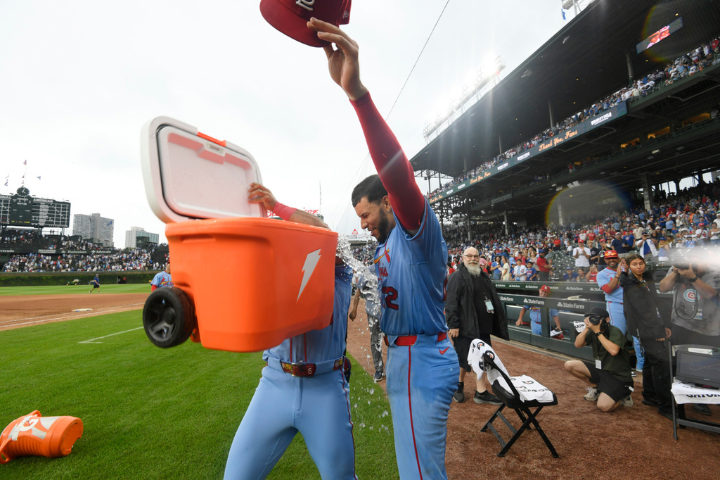 St. Louis Cardinals' Joshua Baez (22) gets dunked after defeating the Chicago Cubs in a baseball game against the Chicago Cubs in Chicago, Saturday, Aug. 15, 2026. (AP Photo/Paul Beaty)