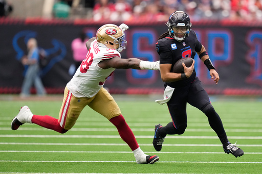 Houston Texans quarterback C.J. Stroud, right, runs with the ball as San Francisco 49ers defensive lineman Mykel Williams defends during the first half of an NFL football game Sunday, Oct. 26, 2025, in Houston. (AP Photo/Eric Christian Smith) Houston Texans quarterback C.J. Stroud, right, runs with the ball as San Francisco 49ers defensive lineman Mykel Williams defends during the first half of an NFL football game Sunday, Oct. 26, 2025, in Houston. (AP Photo/Eric Christian Smith)