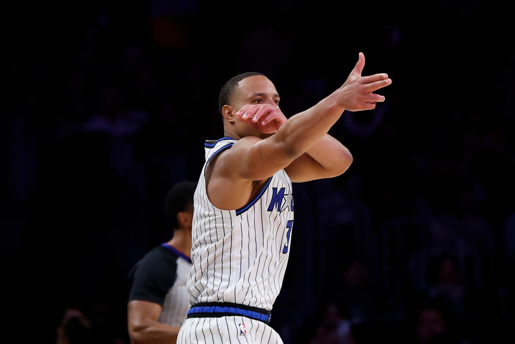 Orlando Magic guard Desmond Bane (3) reacts after shooting a 3-point shot during the second half of an NBA basketball game against the Los Angeles Lakers Tuesday, Feb. 24, 2026, in Los Angeles. (AP Photo/Caroline Brehman)