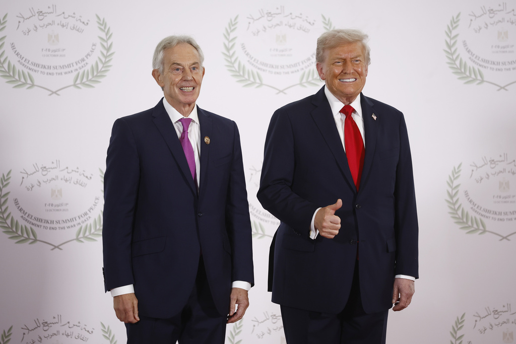 FILE - President Donald Trump and British former prime minister Tony Blair pose at the Gaza Peace Summit in Sharm el-Sheikh, Egypt, Monday, Oct.13 2025. (Yoan Valat, Pool photo via AP, File)