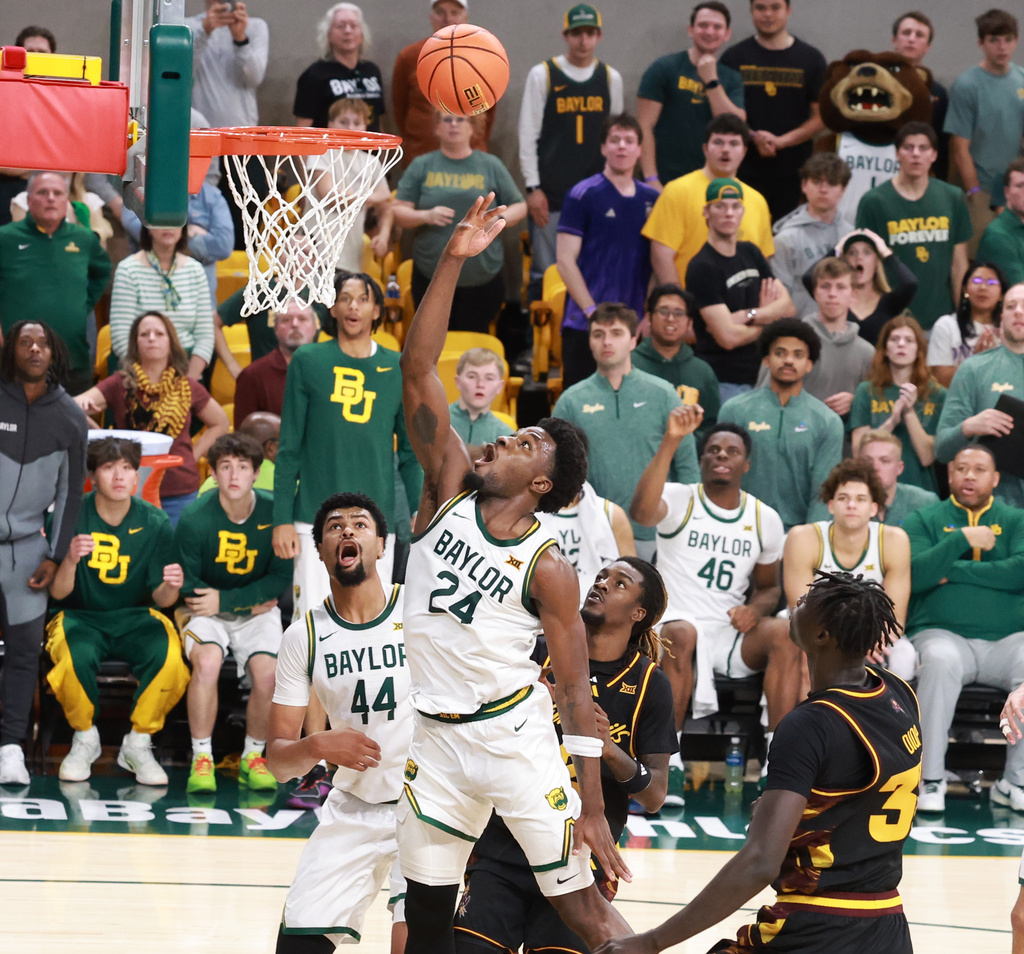 Baylor guard Tounde Yessoufou scores past Arizona State center Massamba Diop in the second half of an NCAA college basketball game, Saturday, Feb. 21, 2026, in Waco, Texas. (Rod Aydelotte/Waco Tribune-Herald via AP)